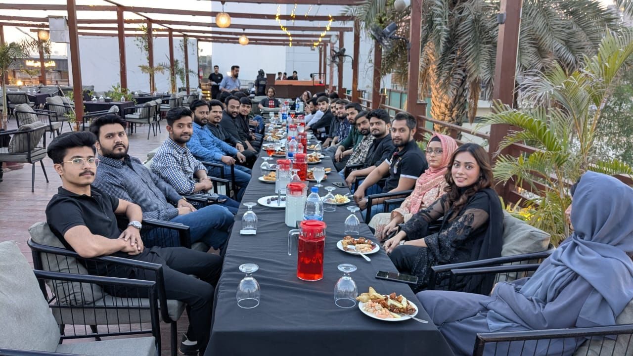 Team dinner at a rooftop restaurant